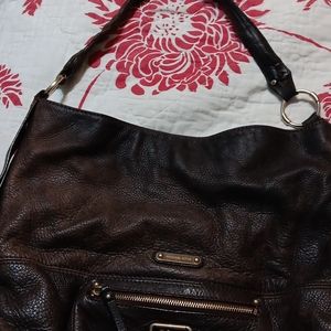 Michael Kors leather shoulder bag brown leather very heavy leather and soft